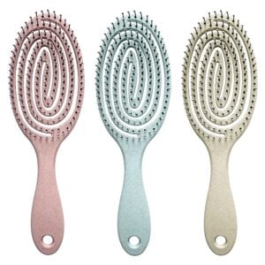 Set of pastel hairbrushes with spiral bristles for detangling and scalp massage.