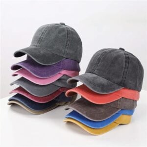 Gradient Stack of Colorful Baseball Caps on Light Background.